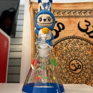 Blue and Clear Glass Beaker with Character Design